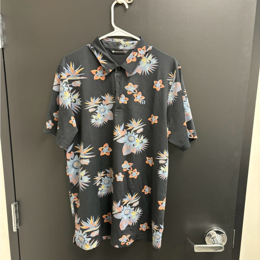NWOT Travis Mathew ‘Secluded Island Polo’ - Men’s Size Large